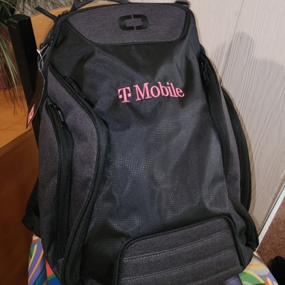 UNISEX T-MOBILE  New Black  OGIO Hatch Pack,  Backpack. 91001 - T-Mobile stitch.